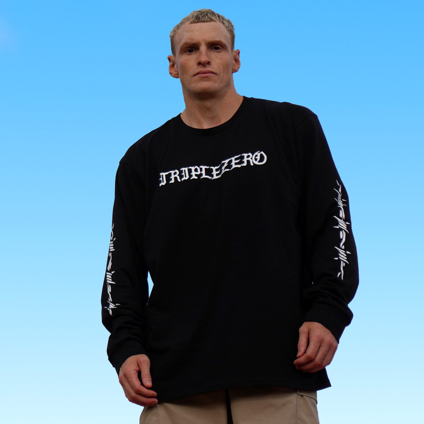 model wearing triplezero black long sleeve barbed tshirt